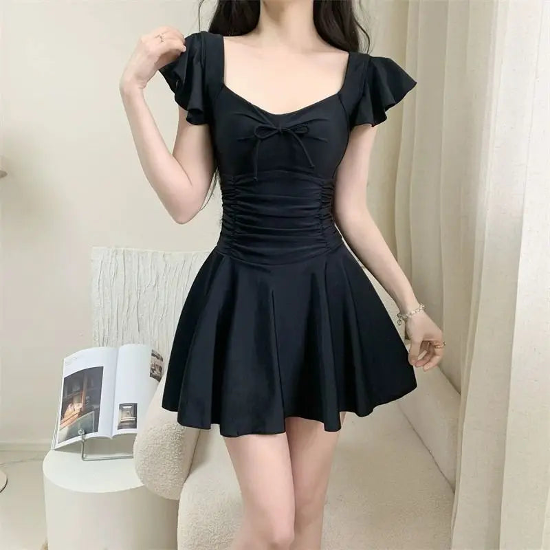 2026 Women Open Back Short Sleeve Swimsuit Solid Color Slimming Bathing Suit with Padding Thermal Spa Hot Spring Swimwear