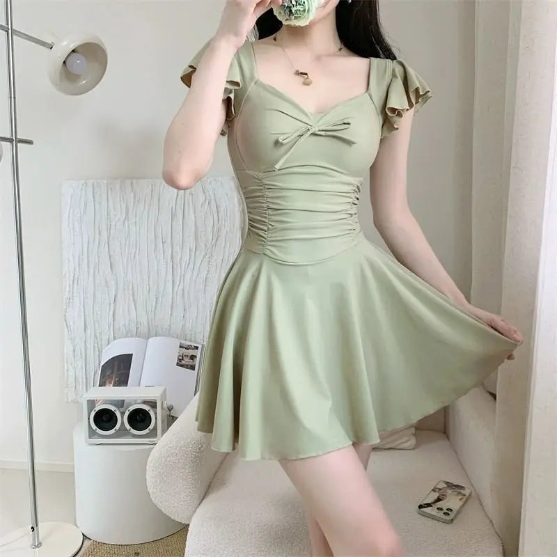 2026 Women Open Back Short Sleeve Swimsuit Solid Color Slimming Bathing Suit with Padding Thermal Spa Hot Spring Swimwear